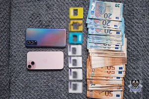 Na zdjeciu zabezpieczone telefony, gotówka oraz karty sim.