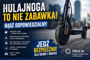 Plaka z apelem o bezpieczna jazdę hulajnogą